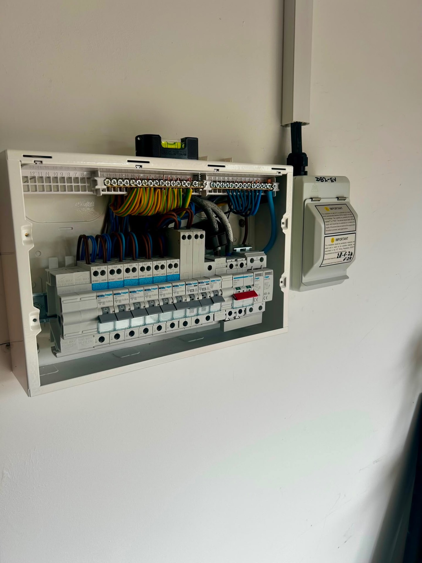 New Hager consumer unit wired alongside EV charger isolator